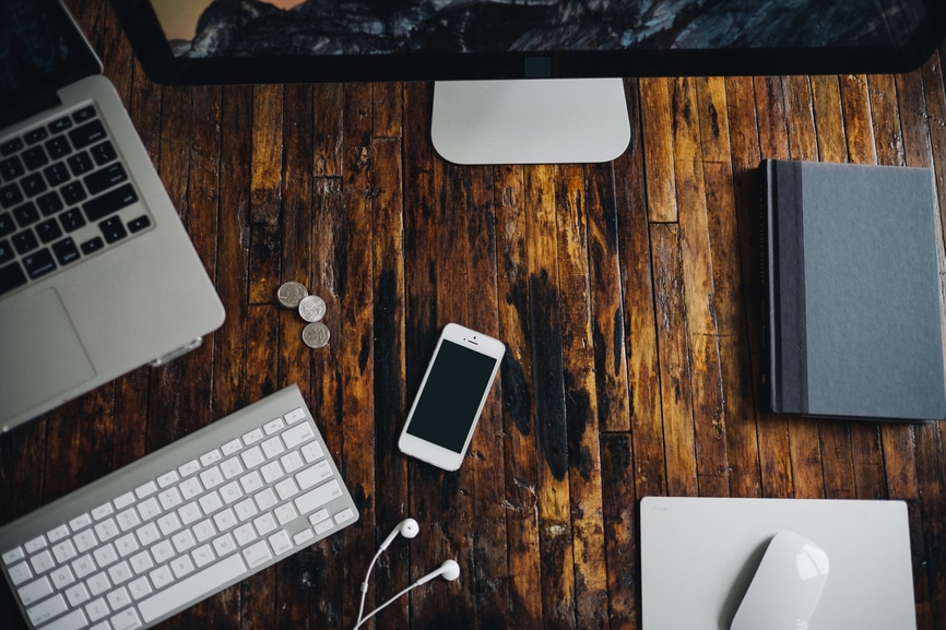 Aerial view of a clean hip desk. iOS Developer Resources Roundup